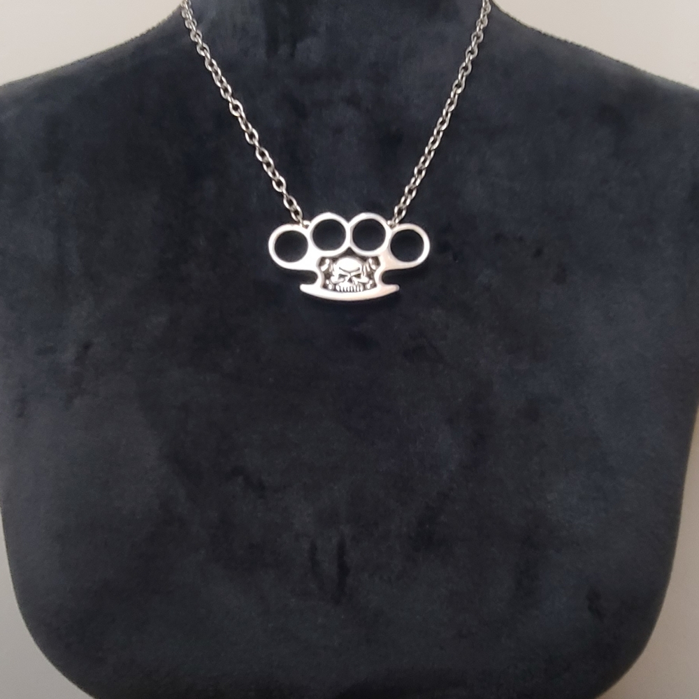 Rock rebel brass knuckle/ skull necklace